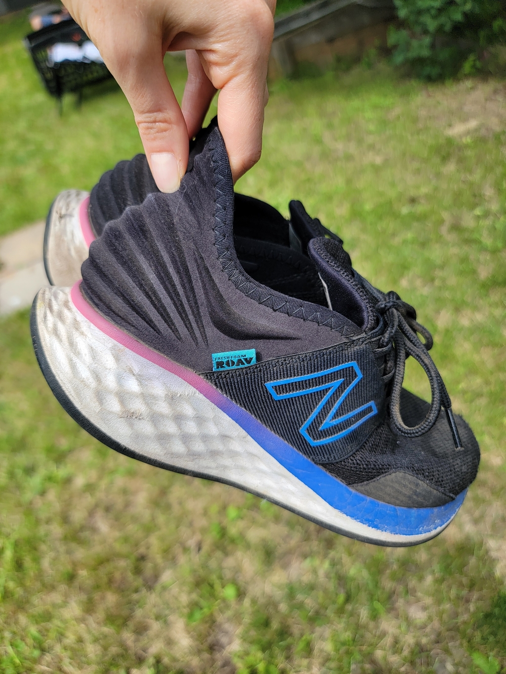 New Balance Black Running Shoe with Blue and Pink Accents